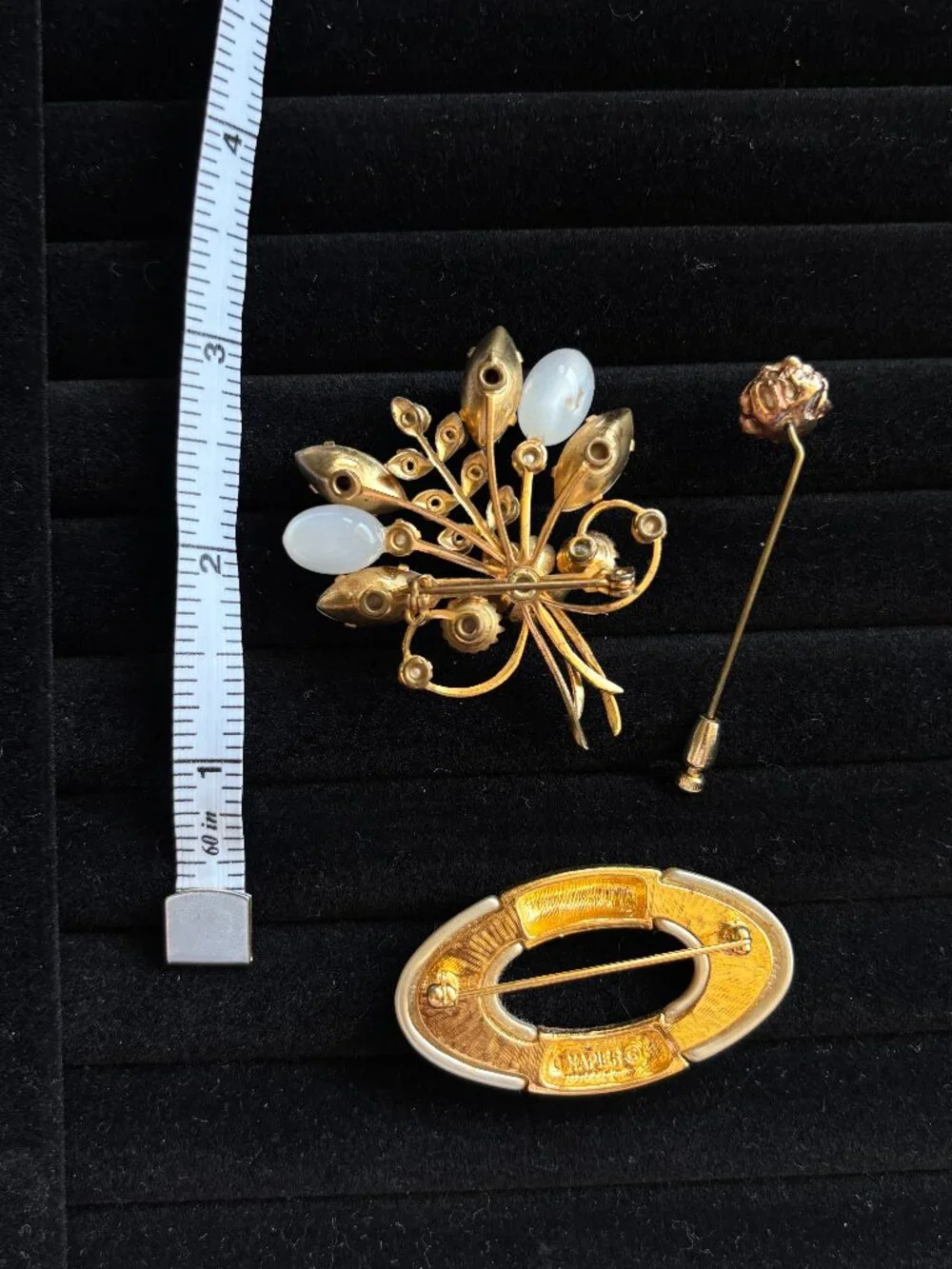 Vintage Gold and white brooches